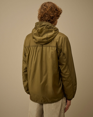 C.P. Company Nada Shield Packable Primaloft® Evolve Hooded Lens Jacket Dried Herb Green 20CMOW070A110467W
