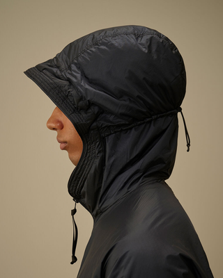 C.P. Company Nada Shield Packable Primaloft® Evolve Hooded Lens Jacket Black 20CMOW070A110467W