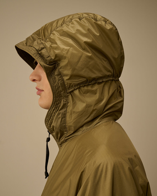C.P. Company Nada Shield Packable Primaloft® Evolve Hooded Lens Jacket Dried Herb Green 20CMOW070A110467W